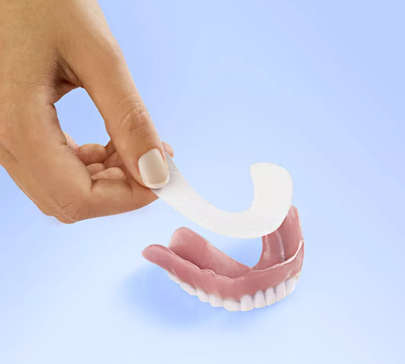 A Denture Adhesives that Keeps Loose-Fitting Dentures in Place